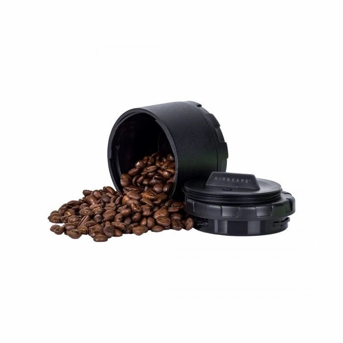 Airscape Mini CarGo Can Bru Trek Airscape Coffee Storage Container Bean Storage container Black on White Background Beans pouring out of container 50g