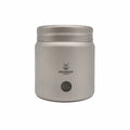 Silver titanium metal container with coffee beans on a white background Basic Barista Coffee Gear Logo Etched Coffee Bean Storage container