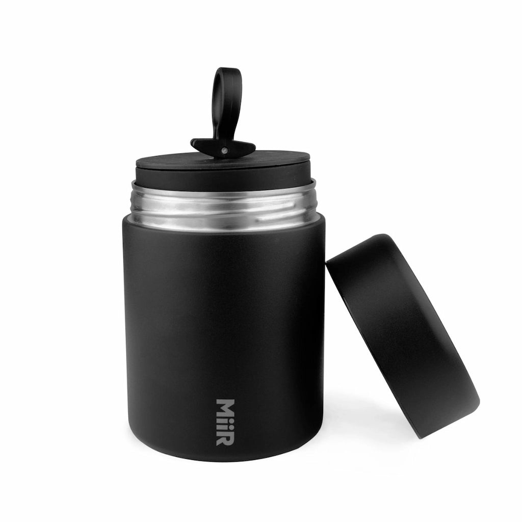 Black insulated mug with a lid on a white background, featuring the MIIR brand.