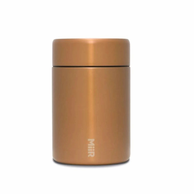 copper Miir coffee storage canister thermos with 'MiiR' branding on a white background