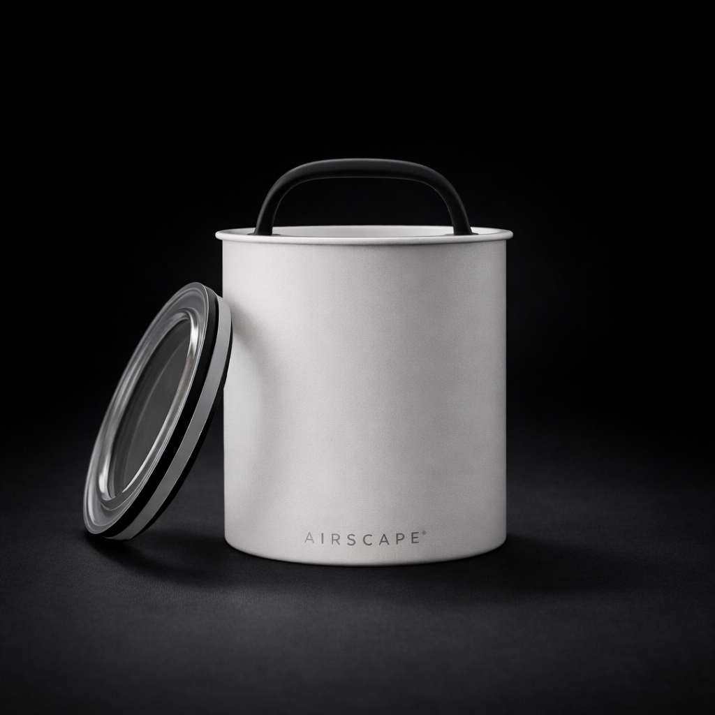 Matte White air storage canister with 'AIRSCAPE' branding on a black background Cinematic, dark, shadowy